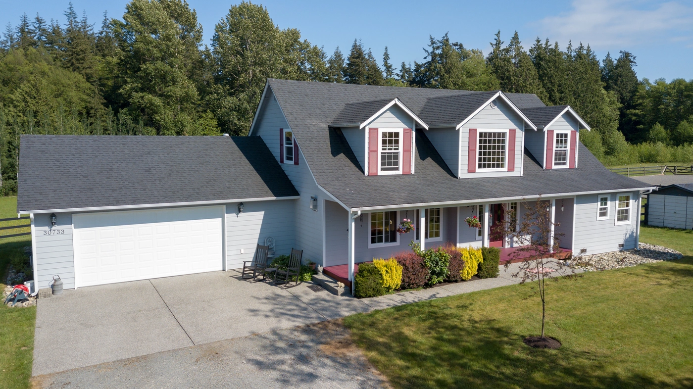 asphalt shingle roof repair on home garage
