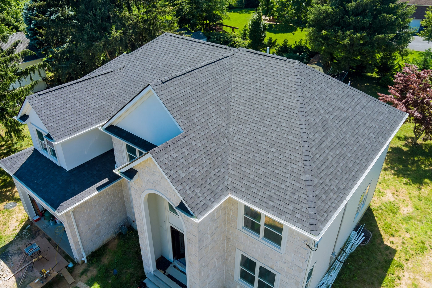 aerial view of asphalt shingle roof repair and replacement