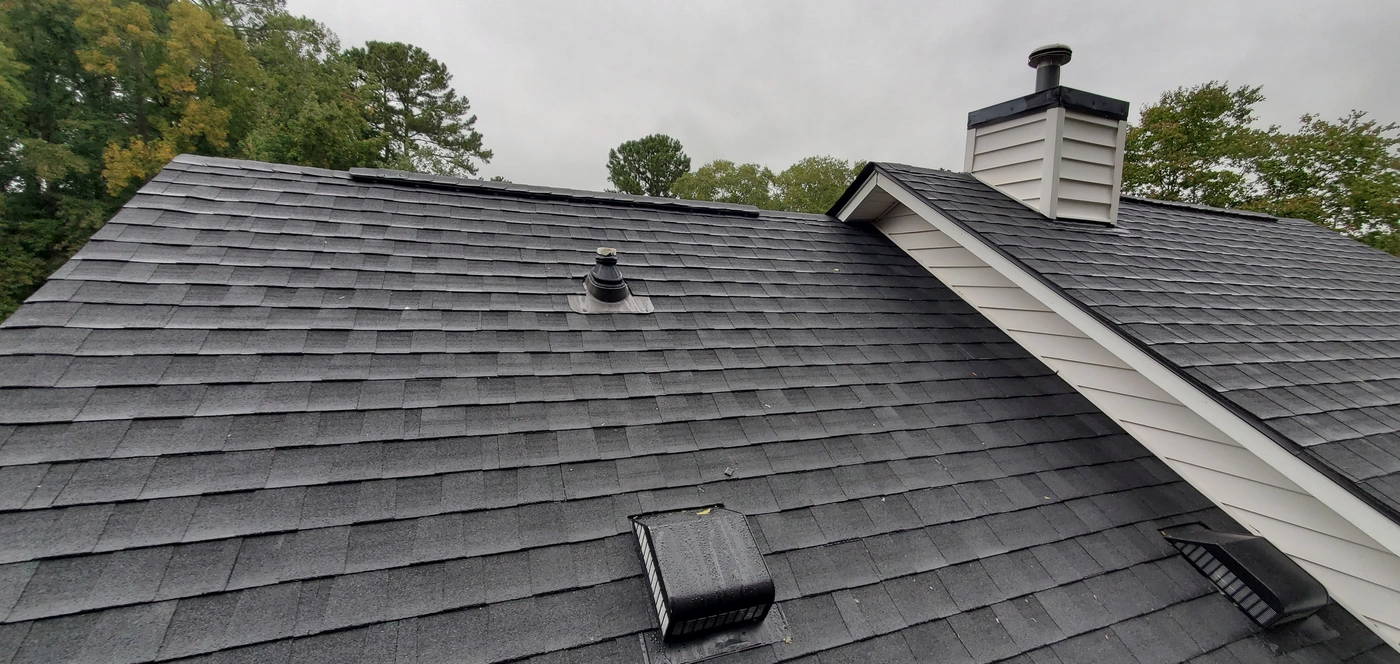 close up view of asphalt shingles installed on roof