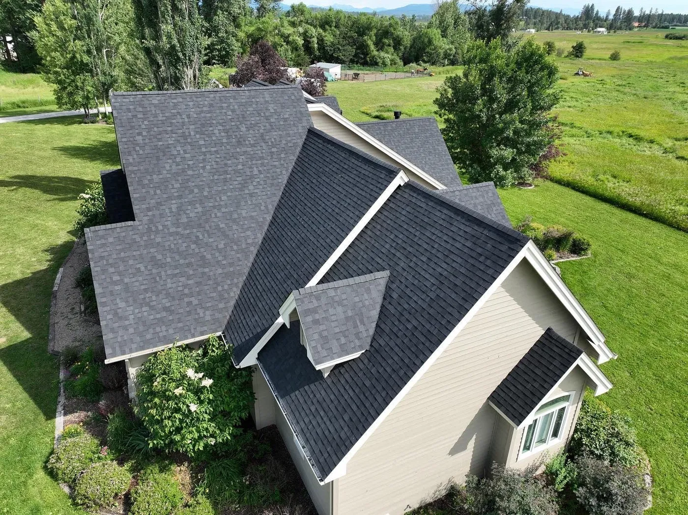 new asphalt shingles installed on residential home in hungry horse