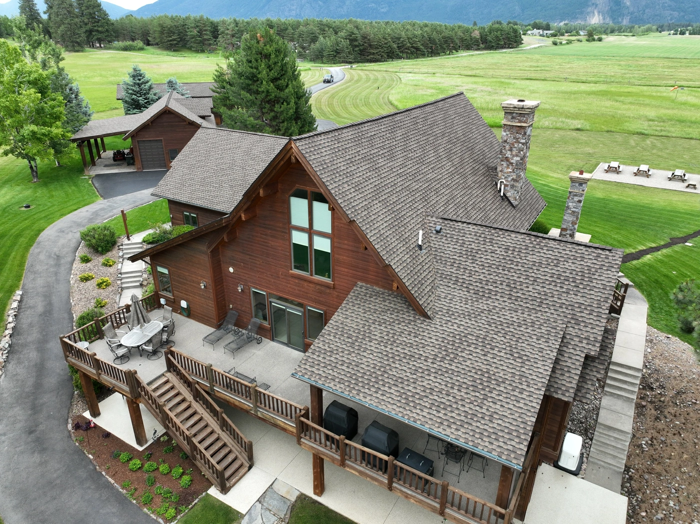 aerial view of new roof installation in lakeside mt by montana roofing solutions