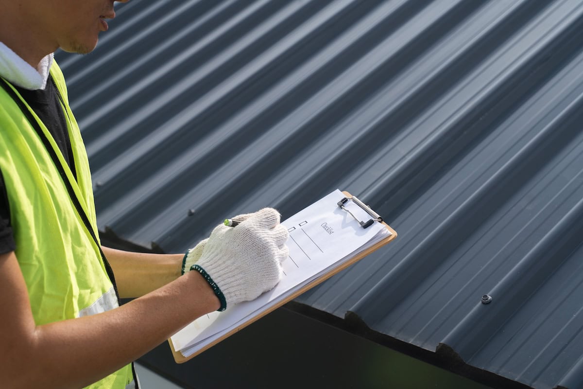 inspecting roof