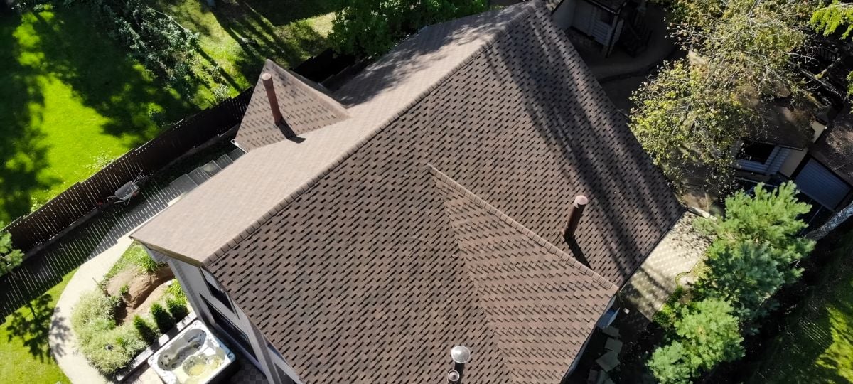 aerial view of a brown shingle roof