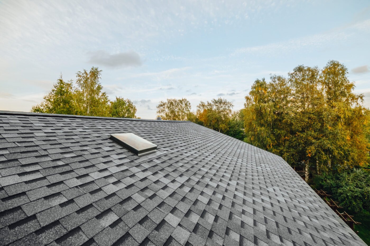 renovated roof covered with shingles flat polymeric roof-tiles