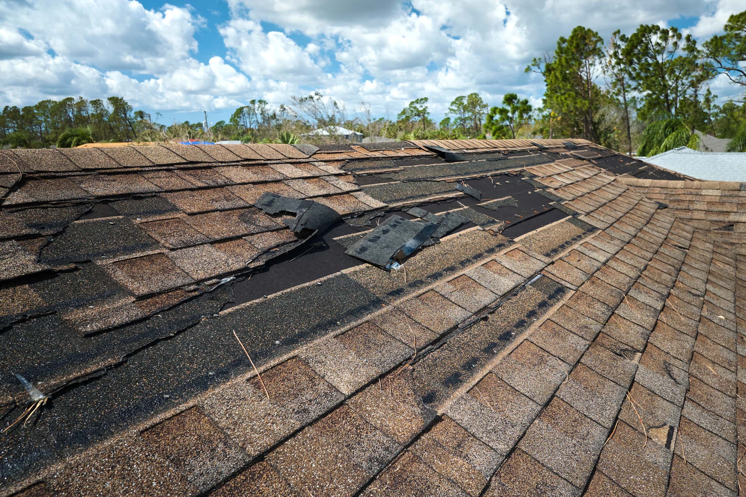 storm damage roof inspection shingles house missing